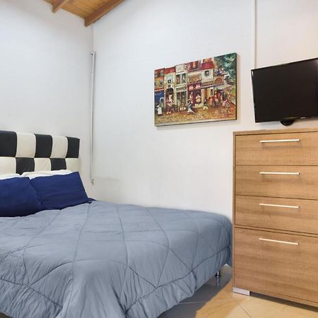 Poblado Brownstone Apartment Medellin Bagian luar foto