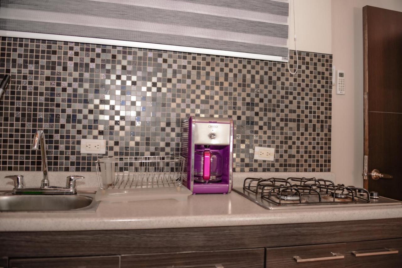 Poblado Brownstone Apartment Medellin Bagian luar foto